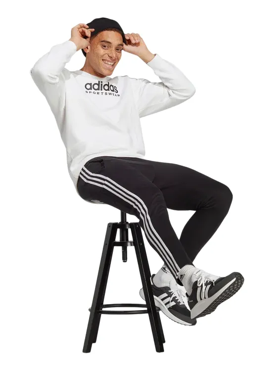 Adidas Pantalone sportivo da uomo in jersey 3 Strisce IC0044 black