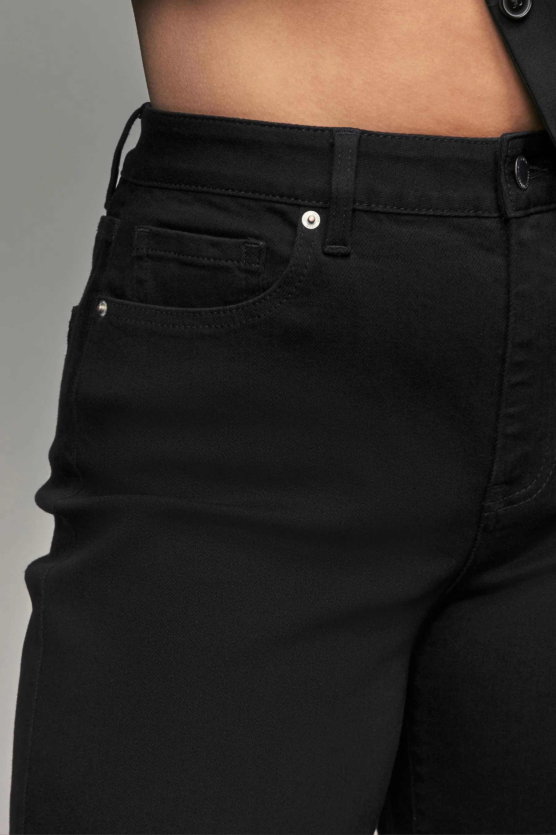 Jeans a clessidra con fondo ampio